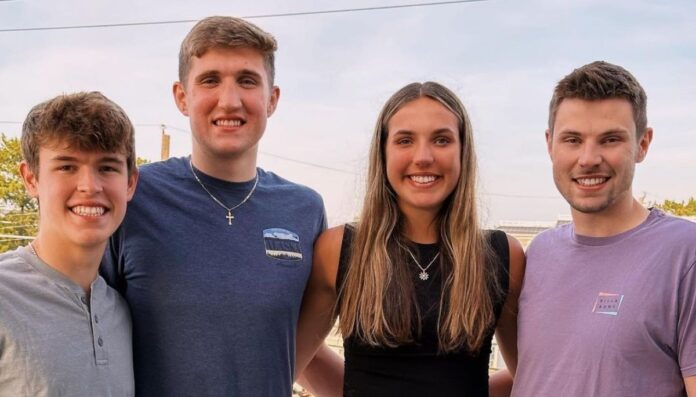 Andrew Carr with his brothers Peter and Alexander and sister Lizzie