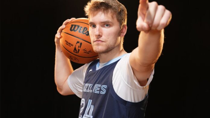 Cam Spencer holding a ball