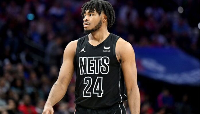 Cam Thomas wearing his Nets jersey