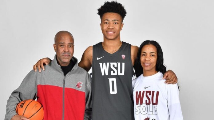 Jaylen Wells posing with his parents