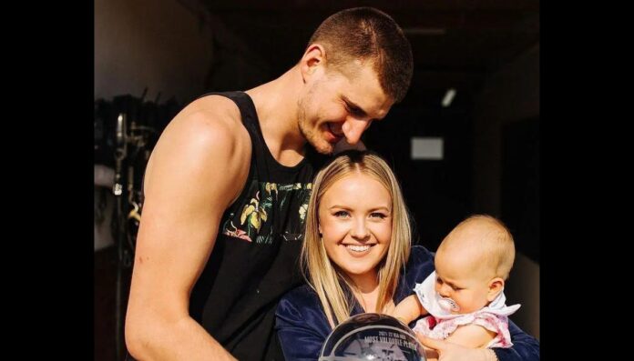 Nikola Jokic and his wife Natalija with their daughter