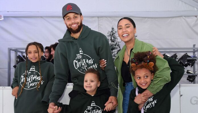 Stephen Curry with his wife and children