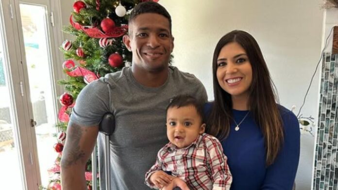 Anthony Robles with his wife and baby