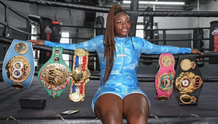 Claressa Shields showing her boxing achievements