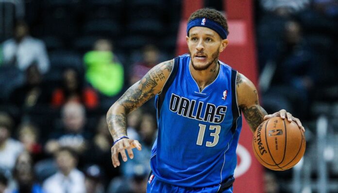 Delonte West wearing his Dallas jersey