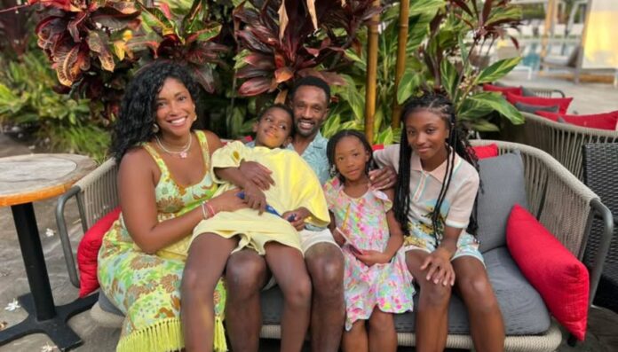 Domonique Foxworth with his wife Ashely Manning and their children