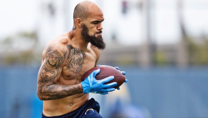 Keenan Allen showing his unique Lumbee Tribe tattoo