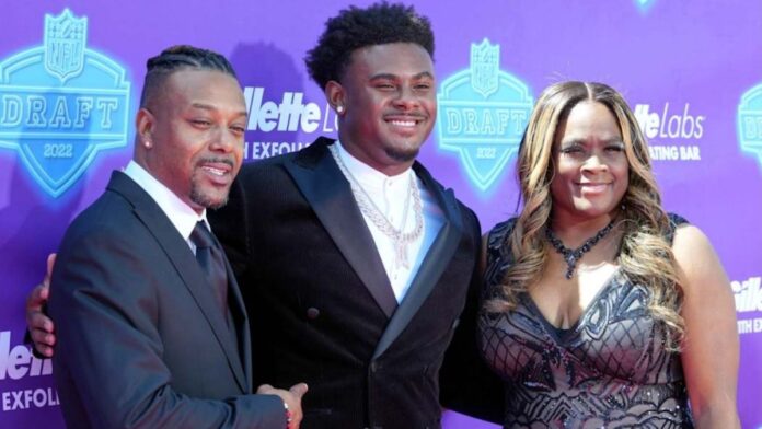 Malik Willis with his parents