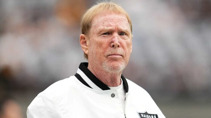 Mark Davis pictured in a white outfit