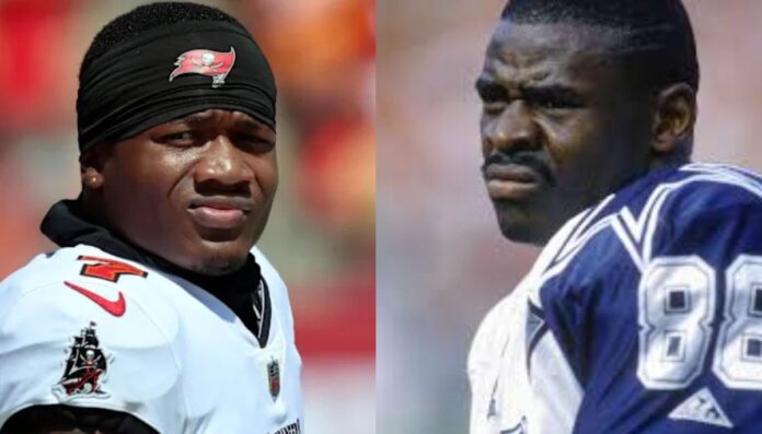 Bucky Irving and Michael Irvin wearing their NFL jersey