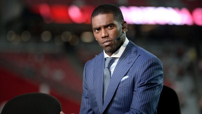 Randy Moss pictured in a suit