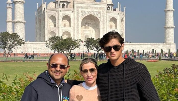 Tim Dutta with his wife Susie and son Timmy Dutta in front of Taj Mahal