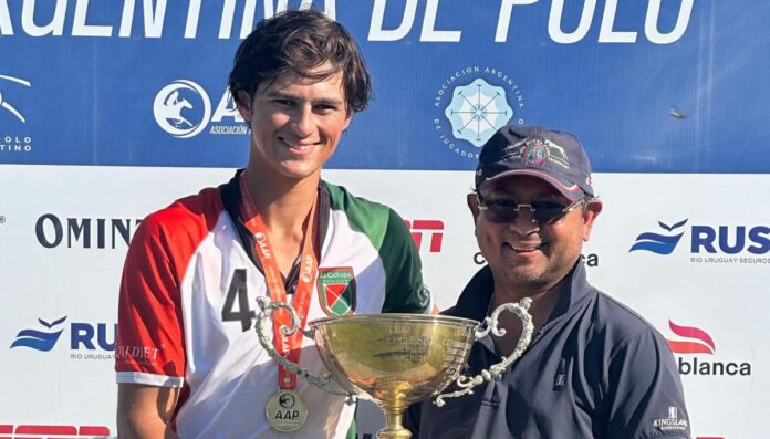 Timmy Dutta with his father Tim J. Dutta holding a trophy