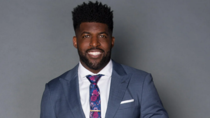 Emmanuel Acho wearing formal cloths